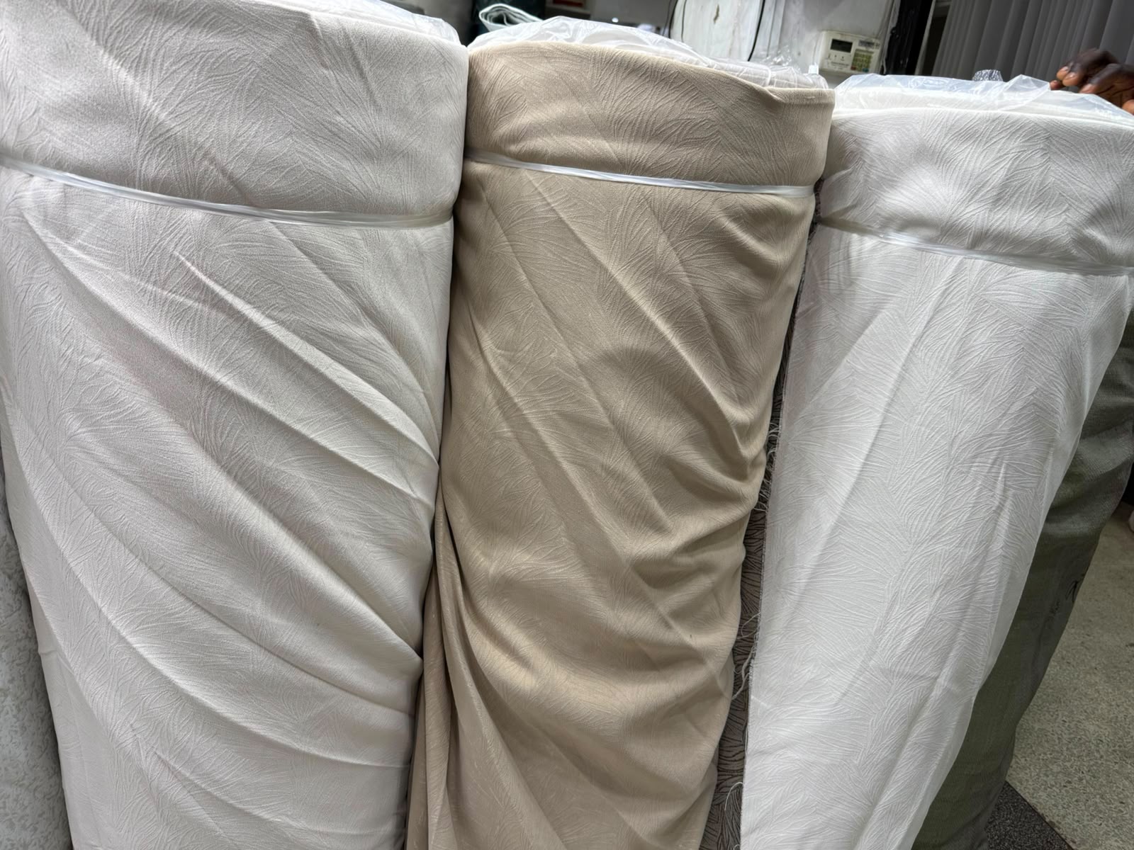 Abdii Finest Curtains Fabric Atelier — premium textured curtain fabric rolls Eastleigh showroom